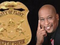 articles/2014/12/03/a-black-cop-s-tough-words-for-mike-brown/141202-chapman-flint-cop-tease_bppvif