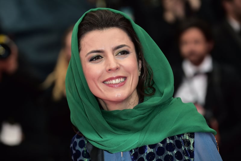 articles/2014/05/23/the-kiss-that-sent-iran-crazy-and-an-actress-to-be-flogged-in-public/140523-leila-hatami-tease_m1kgle
