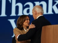 Democratic presidential candidate and U.S. Vice President Kamala Harris and U.S. President Joe Biden embrace on stage during Day one of the Democratic National Convention (DNC) in Chicago, Illinois, U.S., August 19, 2024.