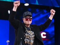 Elon Musk walks on stage during the annual Conservative Political Action Conference (CPAC) in Oxon Hill, Maryland, on February 20, 2025.