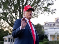U.S. President Donald Trump talks to the media after walking off Marine One on the South Lawn of the White House on October 05, 2025 in Washington, DC. Trump was returning from a celebration of the Navy’s 250th anniversary in Norfolk, Virginia. (Photo by Tasos Katopodis/Getty Images)