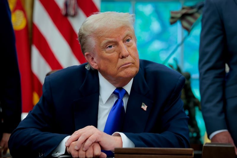 WASHINGTON, DC - MAY 05: U.S. President Donald Trump takes a question from a reporter in the Oval Office at the White House on May 05, 2025 in Washington, DC. Trump signed new proclamations and executive orders, including one that ends federal funding for so-called "gain-of-function" studies, which explores the use of microorganisms to alter biological functions in the aid of gene products. (Photo by Anna Moneymaker/Getty Images)