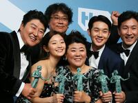 The "Parasite" cast poses at the 26th Annual Screen Actors Guild Awards in 2020, including Director Bong Joon-ho (back) and recently deceased Lee Sun-Kyun (far-right).