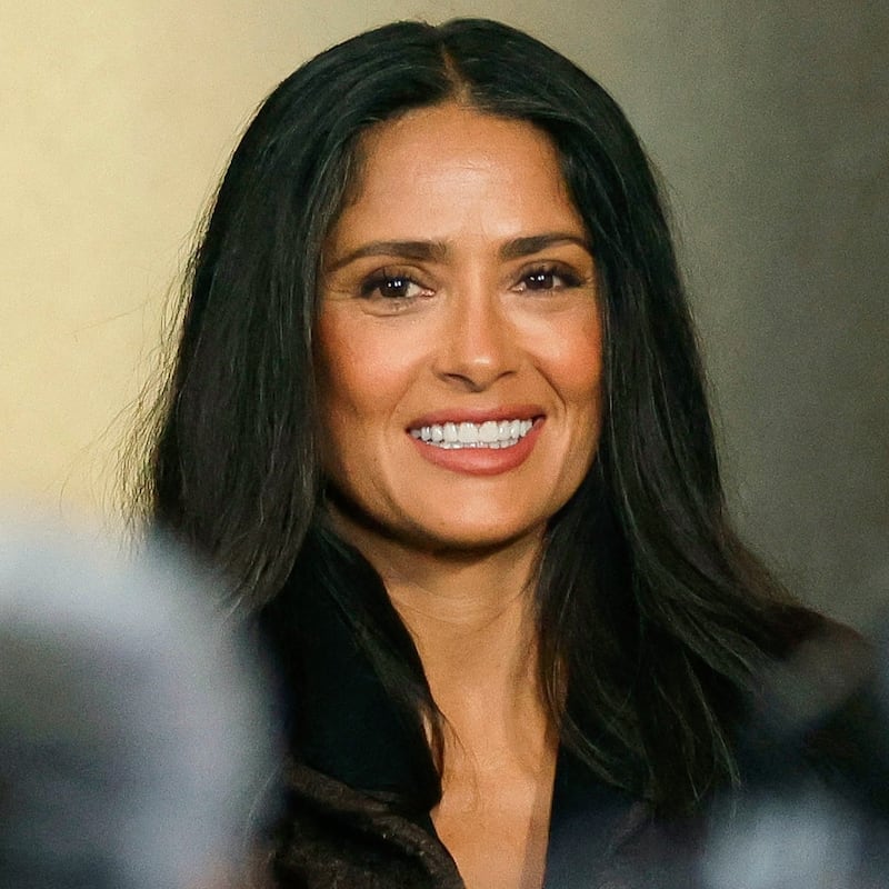 Mexican actress Salma Hayek gestures during a press conference to announce a government incentive scheme for the audiovisual and film industry, in Mexico City, on February 15, 2026. Hayek announced that she is working on a new film aimed at highlighting Mexico's image and responding to the attacks that, she said, have been directed at her country.