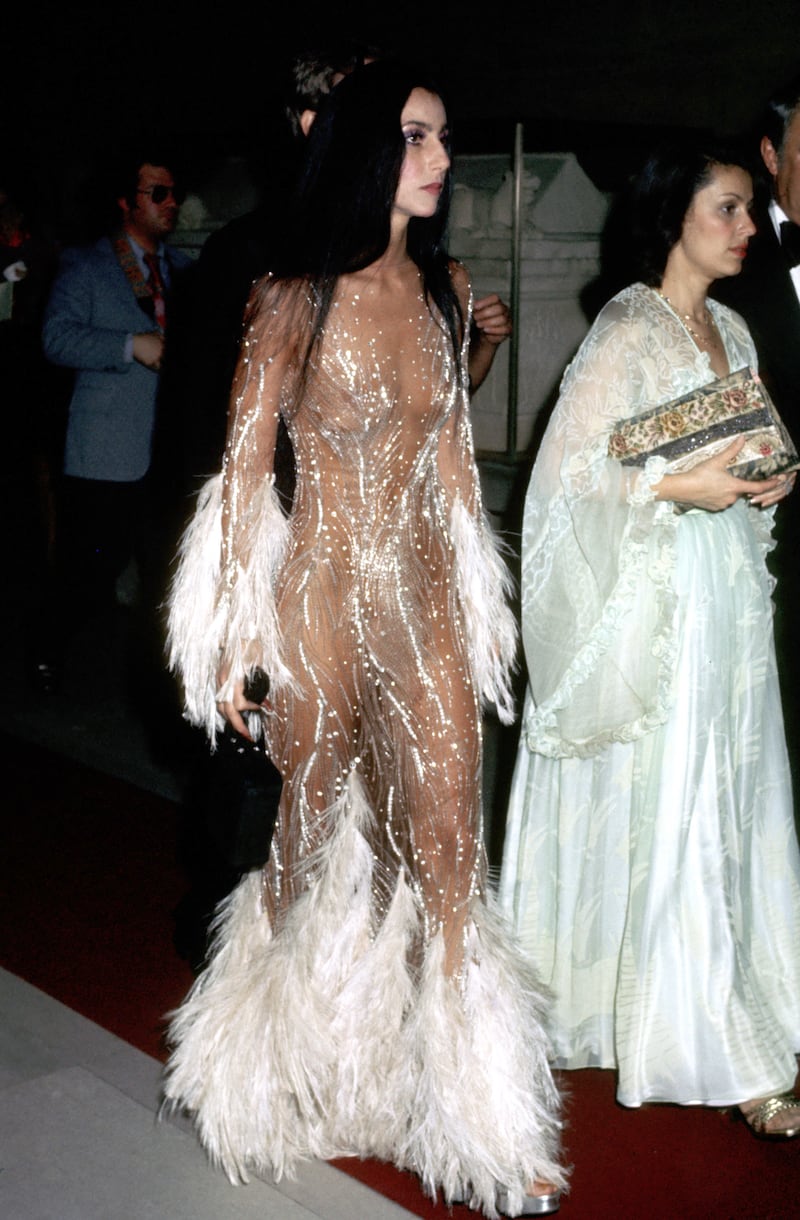 Mackie said photographers were scrambling to get a shot of Cher's naked look at the 1974 Met Gala.