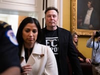 UNITED STATES - MARCH 5: Elon Musk, of the Department of Government Efficiency, leaves a lunch with senate Republicans in the U.S. Capitol on Wednesday, March 5, 2025. DOGE aide Katie Miller appears at left. (Tom Williams/CQ-Roll Call, Inc via Getty Images)