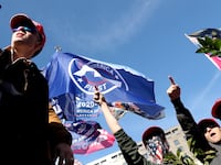 Supporters of the America First ideology and Donald Trump listen to Nick Fuentes as they participate in Stop the Steal and Million MAGA March protests, in Washington, D.C. Nov. 14, 2020.