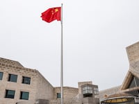 China is warning students that it might be best to remain in the U.S. over the holidays.