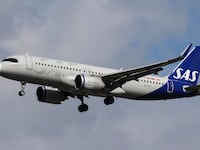 SAS Connect Airbus A320neo passenger aircraft spotted flying before landing on the runway of London Heathrow Airport LHR in the United Kingdom. The A320 NEO airplane has the registration tail number EI-SIP the name Agnar Vking and is powered by 2x CFMI LEAP-1A26 jet engines. SAS Connect is legally Scandinavian Airlines Ireland Ltd airline carrier subsidiary of Scandinavian Airlines SAS Group legally referred to as Scandinavian Airlines System Denmark Norway Sweden with a fleet of 133 planes. September 2024 (Photo by Nicolas Economou/NurPhoto via Getty Images)