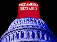 A MAGA hat on the Capitol building.