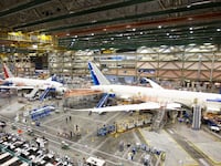 Bodies of Boeing 787s in a row in a factory