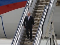 Russian President Vladimir Putin leaves his presidential plane during the arrival ceremony at the Ashgabat International Airport on June 29, 2022 in Ashgabat, Turkmenistan.