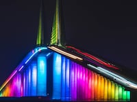 Rainbow colors illuminate the Sunshine Skyway Bridge in Florida.