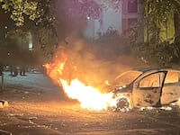 A car set on fire as riots erupted in the Paris suburbs over the police shooting of teen driver Nahel M. in Nanterre.