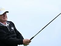 TOPSHOT - US President Donald Trump watches his drive after playing from the first tee to officially open the Trump International Golf Links course in Balmedie, Aberdeenshire, north east Scotland on July 29, 2025. (Photo by Brendan SMIALOWSKI / AFP) (Photo by BRENDAN SMIALOWSKI/AFP via Getty Images)