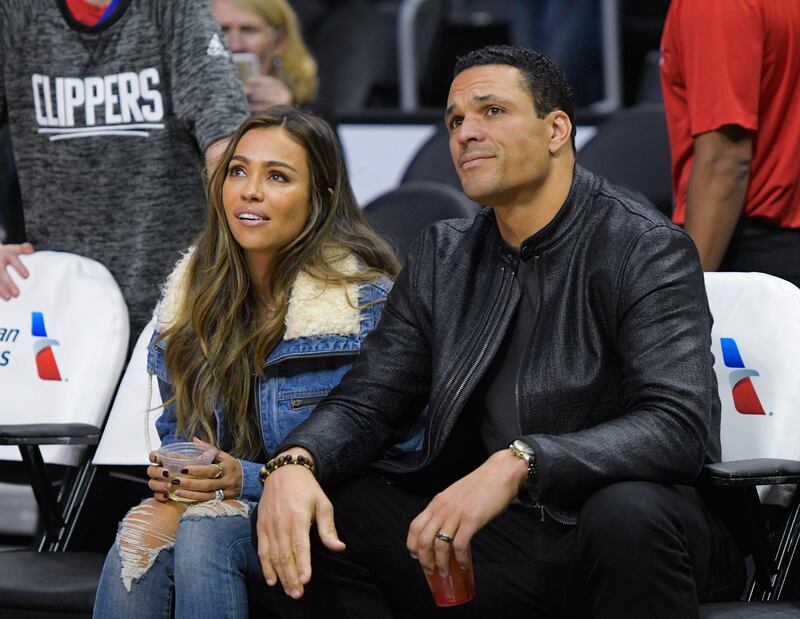 Tony Gonzalez (R) and wife October Gonzalez.