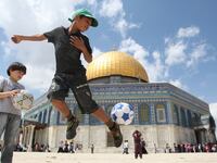 articles/2012/09/05/hurricane-jerusalem-hits-the-dnc/kids-soccer-openz_maithn