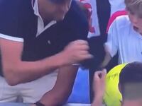 CEO snatches cap from child's hand
