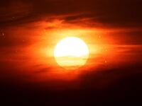 An illustration including a photo of the sun