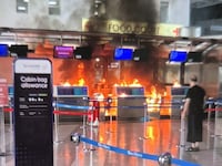 Terrified Tourists Flee Airport After Hammer-Wielding Arson Rampage