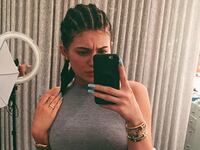 articles/2015/07/14/the-war-over-kylie-jenner-s-cornrows/150714-zimmerman-jenner-tease_xlptjb