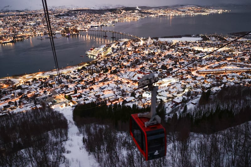 A view of the city and Fjellheisen cable car in Tromso, Norway, where Mads Mikkelsen is from. North of the Arctic Circle, it is a popular destination for northern lights and midnight sun tourism.