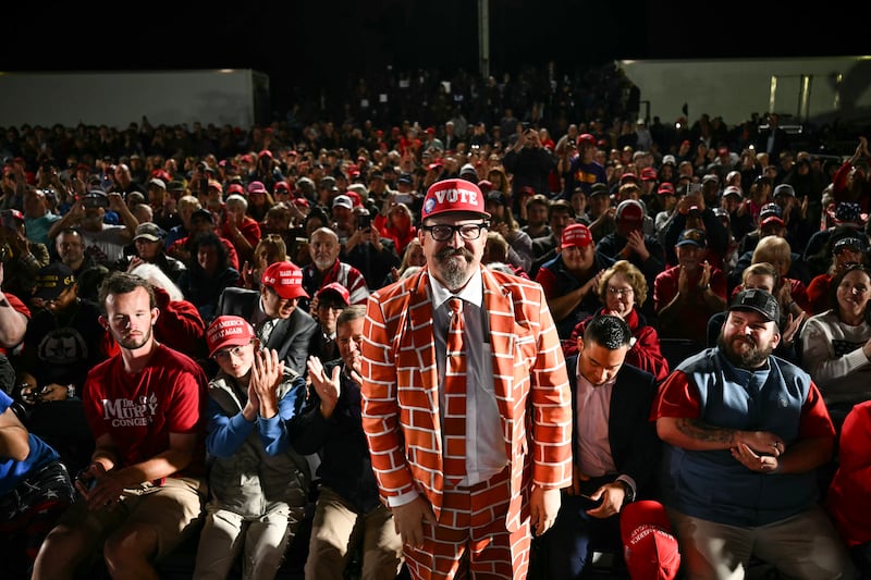 Blake Marnell is seen as US President Donald Trump speaks at a midterm campaign rally at Pitt-Greenville Airport in Greenville, North Carolina, on October 20, 2026. (Photo by Kent NISHIMURA / AFP via Getty Images)