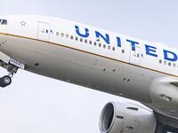 United Airlines Boeing wide body 777-200 aircraft as seen during take off