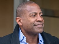 Carlos Watson, CEO of Ozy Media, departs court in February 2023.