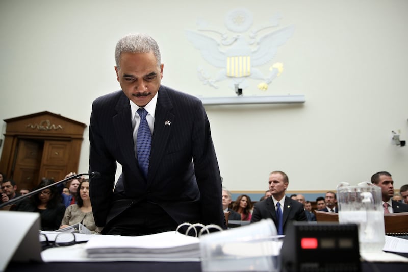 articles/2013/05/30/as-anger-at-eric-holder-grows-so-does-his-value-as-obama-s-lightning-rod/130530-eric-holder-gillespie-tease_ysj8k8