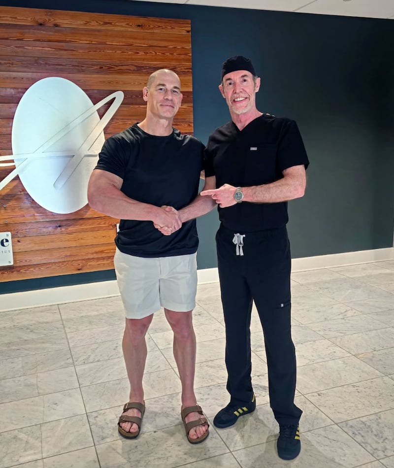 John Cena revealed he had undergone his second hair transplant when he posted a photo on Facebook with plastic surgeon Dr. Ken Anderson.
