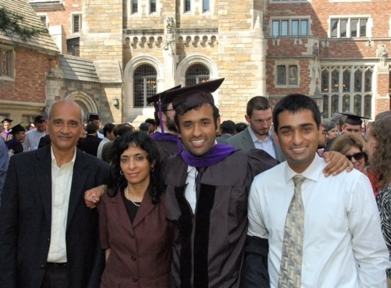 A family with their son and brother graduating from Harvard
