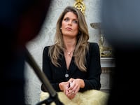WASHINGTON, DC - MARCH 31: Lindsey Halligan, attorney for U.S. President Donald Trump, looks on during an executive order signing in the Oval Office of the White House, on March 31, 2025 in Washington, DC. (Photo by Al Drago/Getty Images)