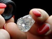 A 30-carat rough diamond is viewed