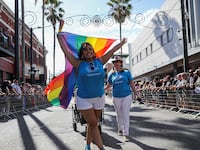 Revelers celebrate during the Tampa Pride Parade.