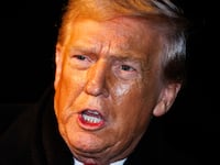 WASHINGTON, DC - JANUARY 20: U.S. President Donald Trump makes a brief statement to reporters before departing from the South Lawn of the White House in Marine One on January 20, 2026 in Washington, DC. President Trump is heading to Switzerland for the Davos Forum as tensions rise around Trumps rhetoric on Greenland. (Photo by Samuel Corum/Getty Images)