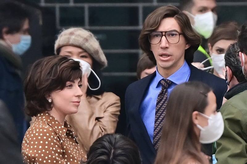 US singer, songwriter and actress Lady Gaga and US actor Adam Driver are pictured on March 11, 2021 on Piazza Duomo in central Milan on the set of the new Ridley Scott movie about the Gucci