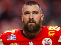 Travis Kelce stares up during the Super Bowl.