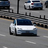 Tesla driving on freeway