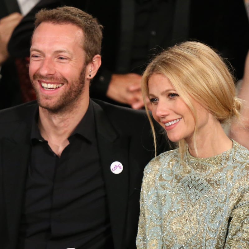 Singer Chris Martin and actress Gwyneth Paltrow at the 71st Annual Golden Globe Awards held at the Beverly Hilton Hotel on January 12, 2014.