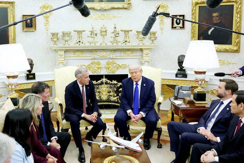 WASHINGTON, DC - OCTOBER 07: U.S. President Donald Trump (R) and Canadian Prime Minister Mark Carney speak to reporters in the Oval Office of the White House on October 07, 2025 in Washington, DC. Carney and Trump will meet in the Oval Office and later have a bilateral lunch where they are expected to discuss a range of topics including U.S. tariffs. Carney visited the White House earlier in the year after he was elected prime minister. (Photo by Anna Moneymaker/Getty Images)