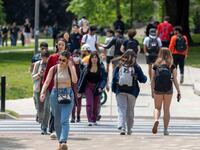 Students walk around campus at the University of Maryland in College Park.