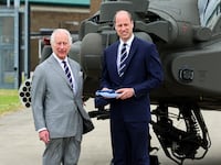 King Charles III and Prince William, Prince of Wales during the official handover in which King Charles III passes the role of Colonel-in-Chief of the Army air corps to Prince William, Prince of Wales