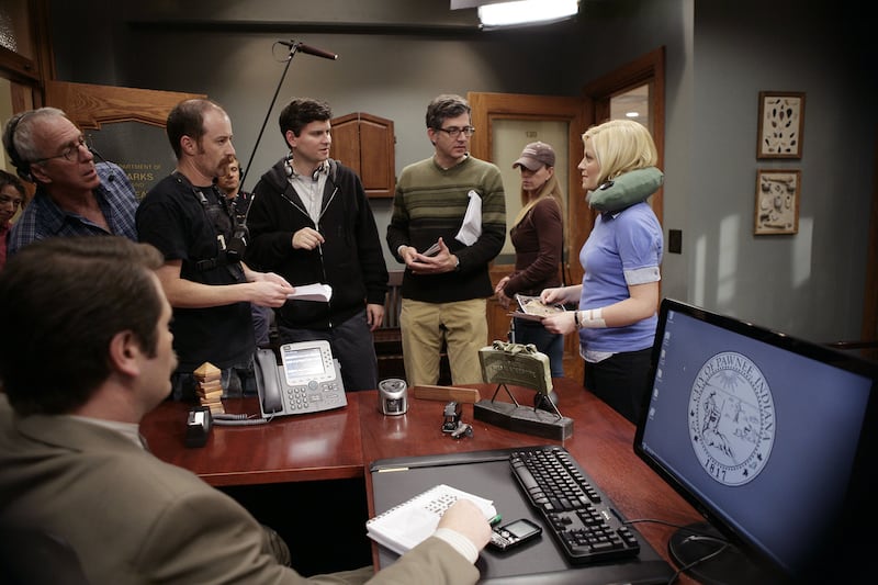 Nick Offerman as Ron Swanson, co-creator Mike Schur, co-creator Greg Daniels and Amy Poehler as Leslie Knope.