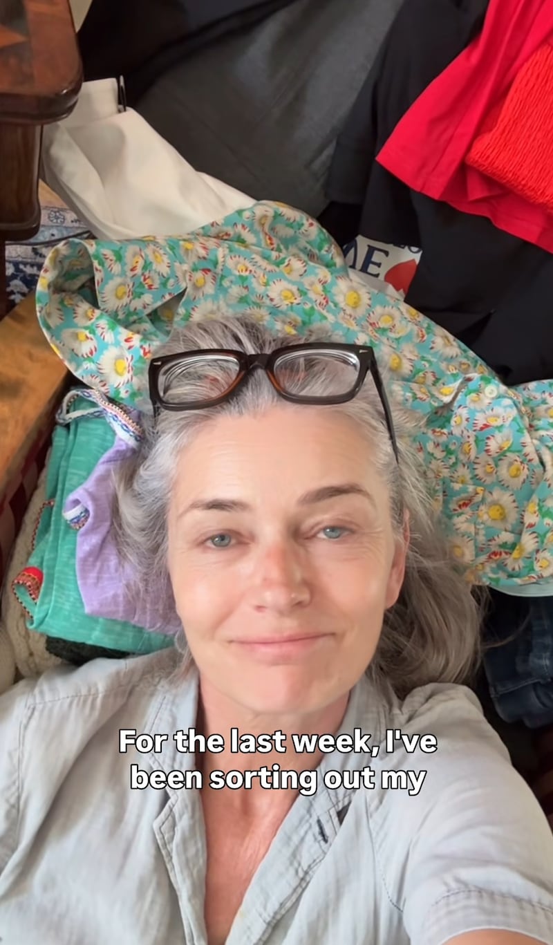 Paulina Porizkova appears to be lying on a pile of clothes while organizing her outfits in a video posted on her Instagram.