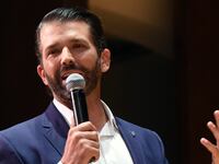 Donald Trump, Jr. gestures as he speaks at the University of Florida.