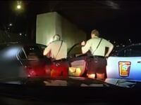 A screenshot from body cam video taken of Minnesota State troopers holding Ricky Cobb at gunpoint.