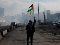 2023-01-08T213841Z_1531323659_RC2CEY9VOP61_RTRMADP_3_ISRAELI-PALESTINIANS-FLAGS_u0xz7r