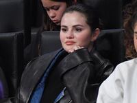Selena Gomez attends a Los Angeles Lakers game