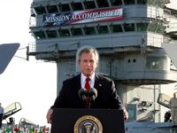 President Bush declares the end of major combat in Iraq as he speaks aboard the aircraft carrier USS Abraham Lincoln off the California coast, Thursday, May 1, 2003. The carrier will arrive in San Diego May 2, 2003, following a record 10-month deployment including "Operation Iraq Freedom." (AP Photo/J. Scott Applewhite)